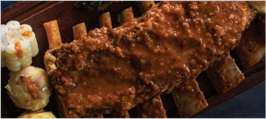 Huatia – Receta Tradicional con Costillar de Res y Hierbas